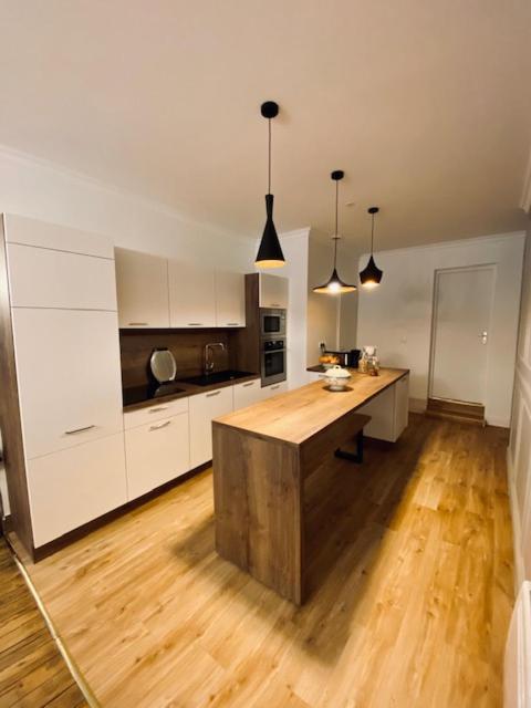 L'Olympique, Appartement 8 Voyageurs Avec Parking 萨维尼亚克莱奥尔莫 外观 照片
